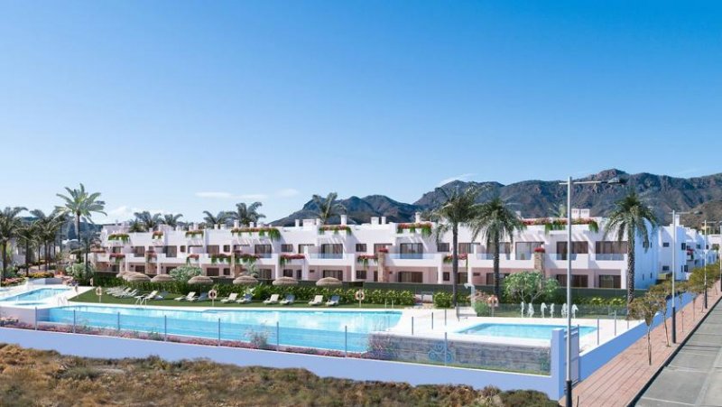 San Juan de los Terreros Erdgeschoss-Wohnungen mit 3 Schlafzimmern, 2 Bädern, Tiefgaragenstellplatz und Gemeinschaftspool in erster Linie am Strand