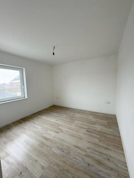 Norden NEUBAU – Bezugsfertige Erdgeschosswohnung mit Photovoltaikanlage, Lüftungsanlage, Carport! Wohnung kaufen