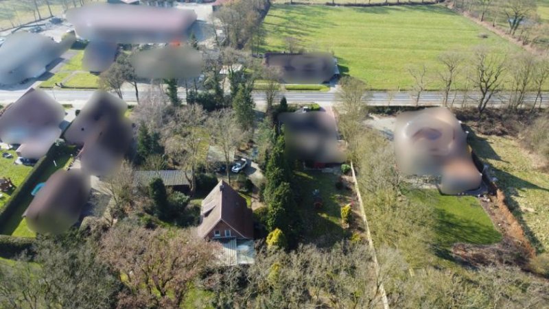 Leer (Ostfriesland) Rarität in Logabirum: Einfamilienhaus mit Bauland für 3 weitere Einheiten! Haus kaufen