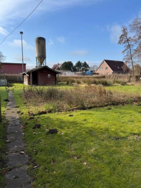 Moormerland Einfamilienhaus mit großem Grundstück – Renovieren & Wohlfühlen in Moormerland! Haus kaufen