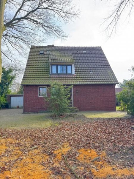 Moormerland Einfamilienhaus mit großem Grundstück – Renovieren & Wohlfühlen in Moormerland! Haus kaufen