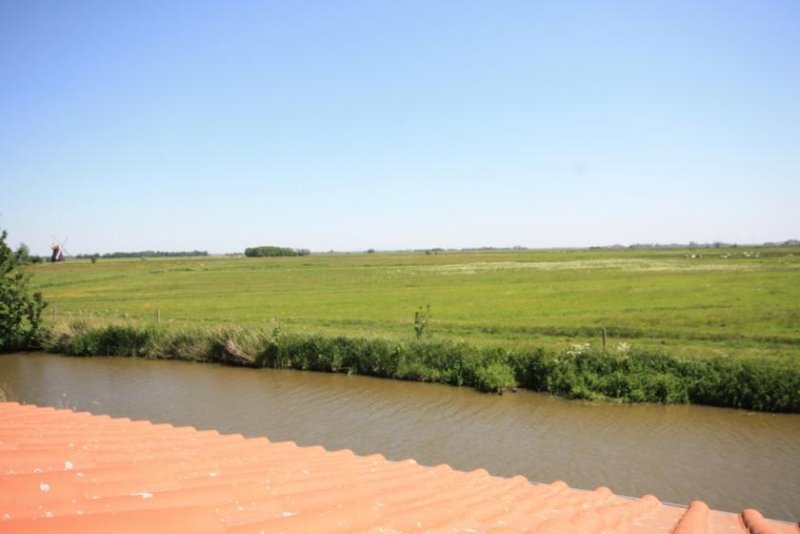 Bunde * Wohnen direkt am Wasser * Ausblick in die Natur * 2 Terrassen * helle Räume * Haus kaufen