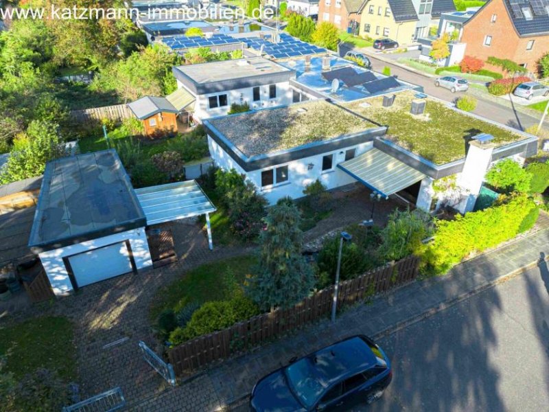 Erftstadt Winkelbungalow mit Garage und idyllischem Garten im Herzen von Lechenich zu verkaufen - 10 Fußminuten bis zum Markt! Haus