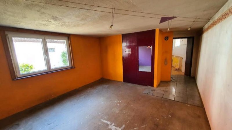 Mutterstadt ObjNr:B-19616 - Freistehendes EInfamilienhaus auf großem Grundstück mit Sanierungsbedarf Haus kaufen