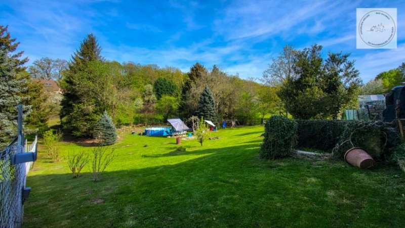 Straubenhardt Familienidyll mit Platz und Charme: Zweifamilienhaus mit großem Garten Haus kaufen