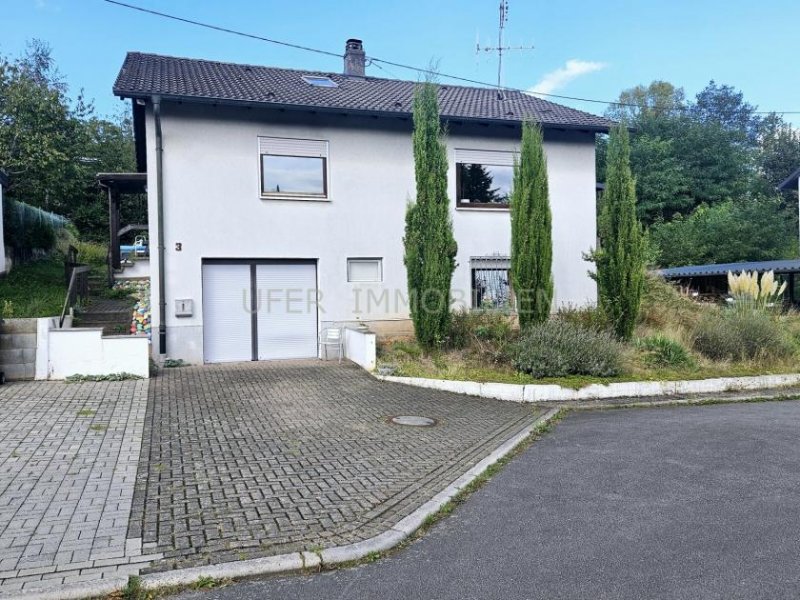 Völkersweiler Gemütliches 1 Familienhaus mit Ausbaumöglichkeit im Souterrain - Hanglage -Massivbauweise Haus kaufen