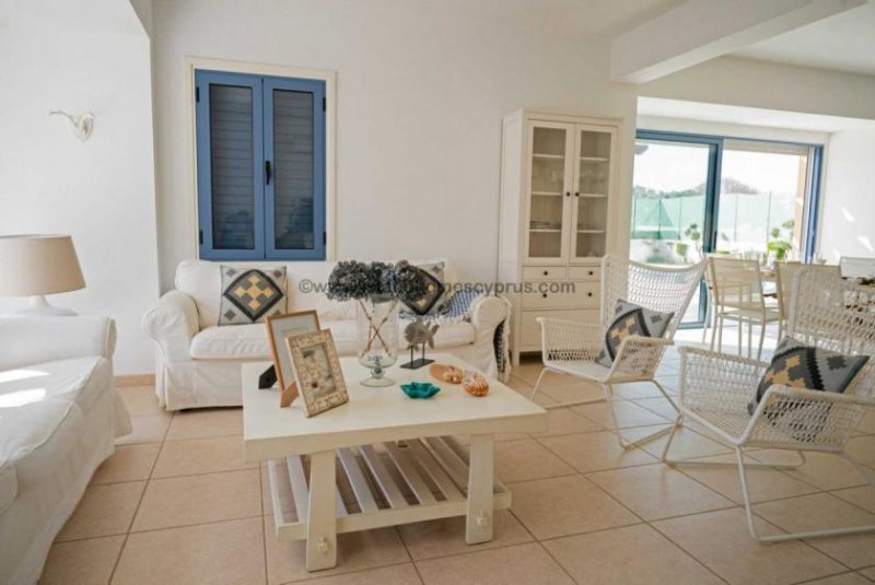 Ayia Triada 4 bedroom, 3 bathroom semi-detached villa less than 150m from the sea in Ayia Triada - PTM102.This stunning villa is perfect for