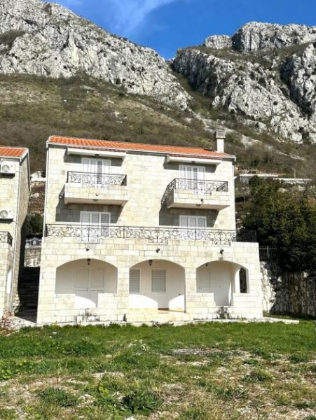 Budva The house has three levels. On the ground floor there is spacious kitchen with dining room, living room, bathroom and a room can