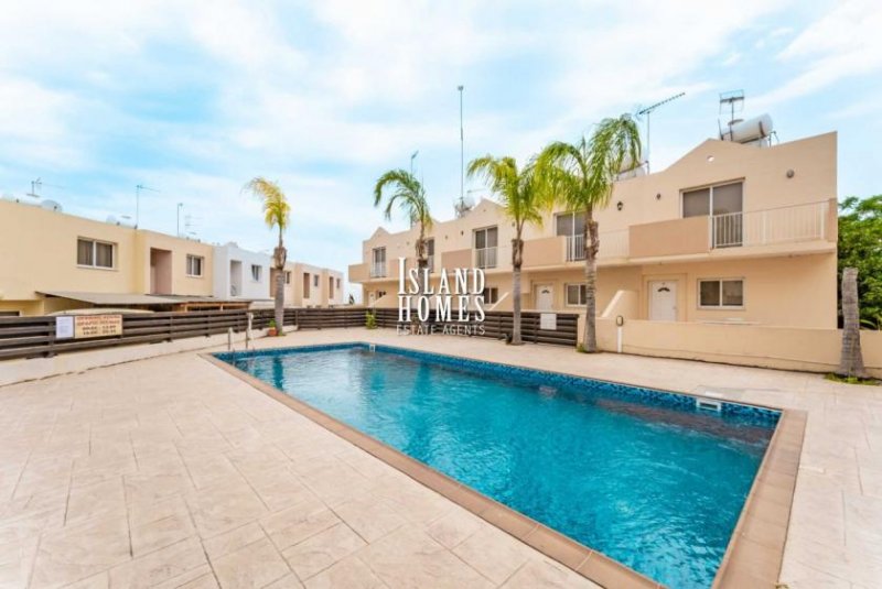 Deryneia 2 bedroom, 1st floor apartment with 24m2 veranda communal swimming pool and TITLE DEEDS ready to transfer on popular complex in