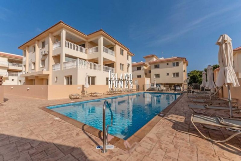 Kapparis 3 bedroom, second floor apartment with TITLE DEEDS on popular complex with two communal swimming pools in great location of -