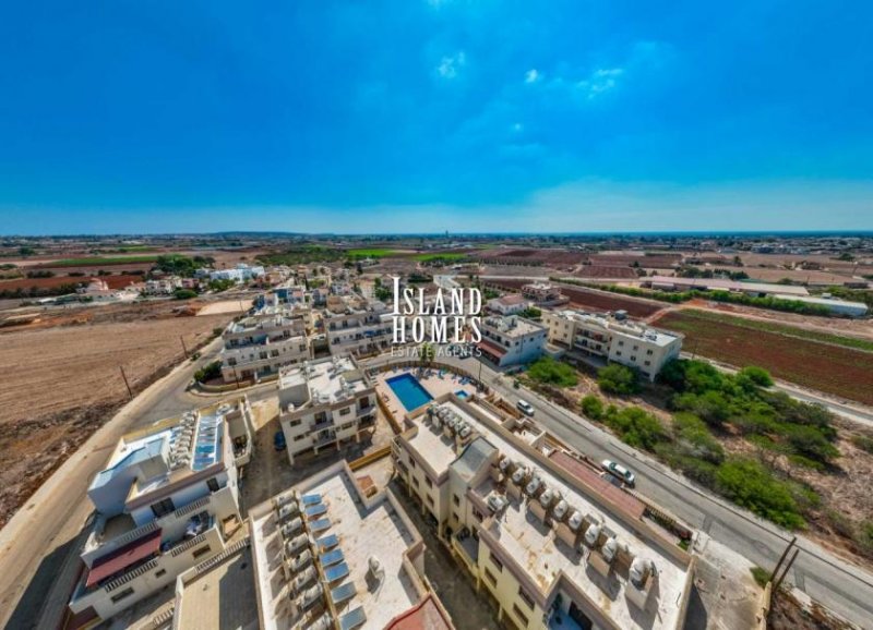 Liopetri 2 bedroom, ground floor apartment with 23m2 veranda and TITLE DEEDS ready to transfer on a popular complex on the outskirts of -