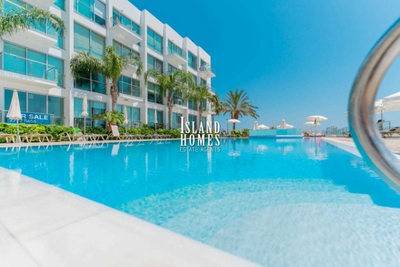 Protaras 1 bedroom, PENTHOUSE apartment with sea views, 2 communal pools and tennis court in SEAFRONT location of Protaras - COR123The of