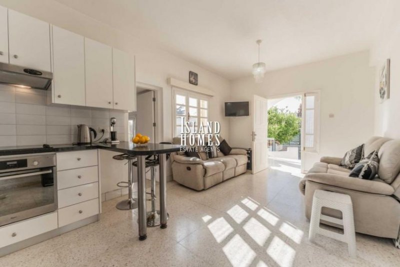 Protaras 2 bedroom, ground floor apartment with TITLE DEEDS, in a cul de sac location just 400m walk to the beach in Protaras - is a sup