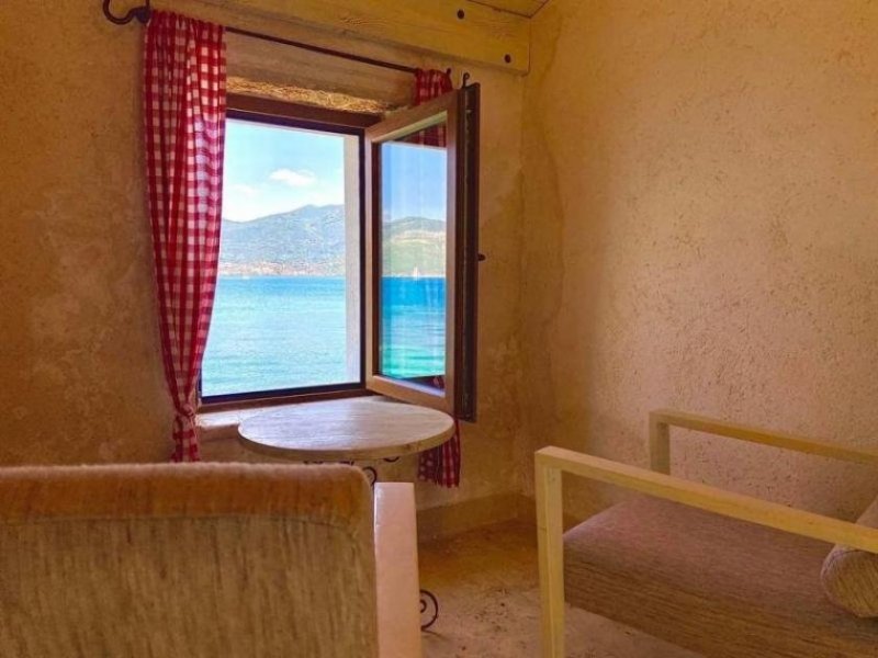 Tivat Rustic waterfront house near Tivat enjoys stunning sea views of the bay and is accessible by boat and car. You can find amazing