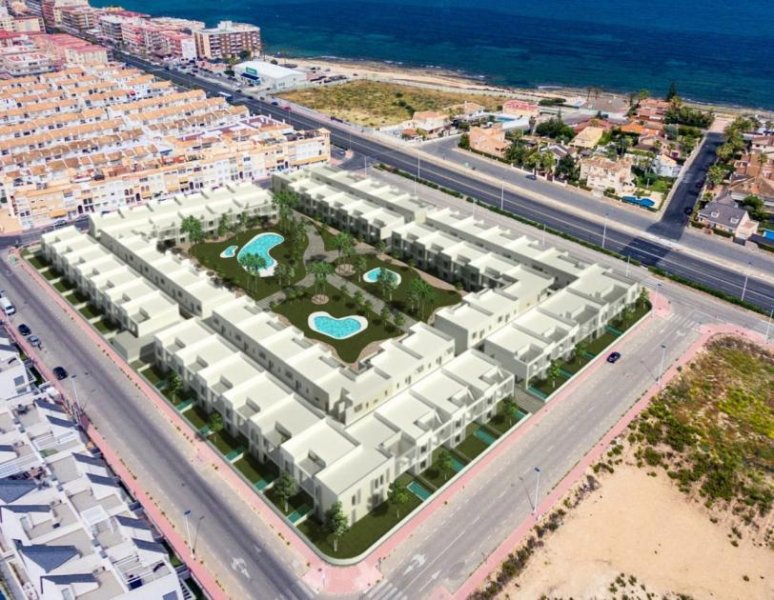 Torrevieja DESIGN-BUNGALOW AM MEER. . Wohnen in einem neu entwickelten Gebiet, nur 250 m vom Meer entfernt. Ausgezeichnete Lage ganz in