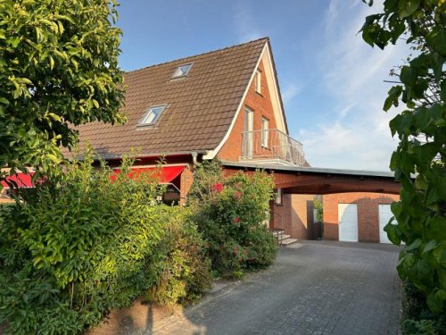 Uelsen Immobilien Doppelhaushälfte mit Garage, Carport und großem Garten im Zentrum Haus 