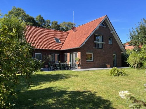 Friedeburg Immobilien Gepflegtes Haus mit EBK, Dachterrasse und Garage! Haus kaufen