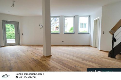 Köln Immo Neubaucharakter: EG-Maisonette-Wohnung mit Dachterrasse und Stellplatz in Köln-Niehl Wohnung kaufen