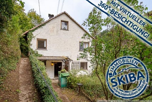 Kesseling Immobilien Sanierungsbedürftiges Zweifamilienhaus mit Blick über das Kesselinger Tal Haus kaufen