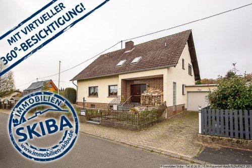 Sierscheid Immobilien Großzügiges Ein- oder Zweifamilienhaus mit ebenem Garten und Garage in Sierscheid Haus kaufen