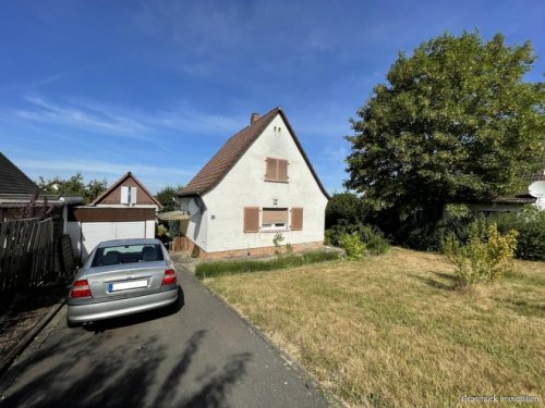 Büdingen Inserate von Häusern Über den Dächern von Büdingen - Schönes Siedlerhaus mit großem Grundstück zu verkaufen Haus kaufen