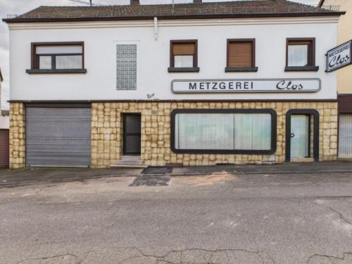 Neunkirchen Hausangebote Zweifamilienhaus mit Gewerbeeinheit in zentraler Lage von Neunkirchen – 230 m² Wohnfläche, 8 Zimmer! Haus kaufen