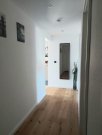 Langgöns Penthouse-Wohnung mit 40qm Dachterrasse direkt in Langgöns Wohnung kaufen