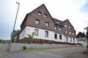 Eschershausen Mehrfamilienhaus mit 7 WE, Werkstattgebäude und 3 Garagen Haus kaufen