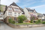 Zell (Mosel) Denkmalgeschütztes Winzerhaus mit großer Garage und Garten mit unverbaubarem Moselblick in Zell/Merl Haus kaufen