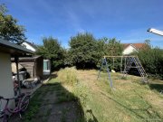 Büdingen Über den Dächern von Büdingen - Schönes Siedlerhaus mit großem Grundstück zu verkaufen Haus kaufen