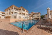 Kapparis 3 bedroom, second floor apartment with TITLE DEEDS on popular complex with two communal swimming pools in great location of -