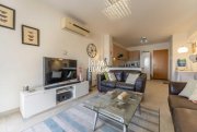 Kapparis 3 bedroom, second floor apartment with TITLE DEEDS on popular complex with two communal swimming pools in great location of -