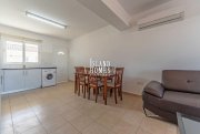 Paralimni 2 bedroom, 1 bathroom apartment with communal swimming pool and established gardens in quiet, but very central location of -