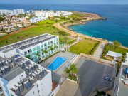 Protaras 1 bedroom, PENTHOUSE apartment with sea views, 2 communal pools and tennis court in SEAFRONT location of Protaras - COR123The of