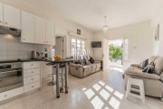 Protaras 2 bedroom, ground floor apartment with TITLE DEEDS, in a cul de sac location just 400m walk to the beach in Protaras - is a sup